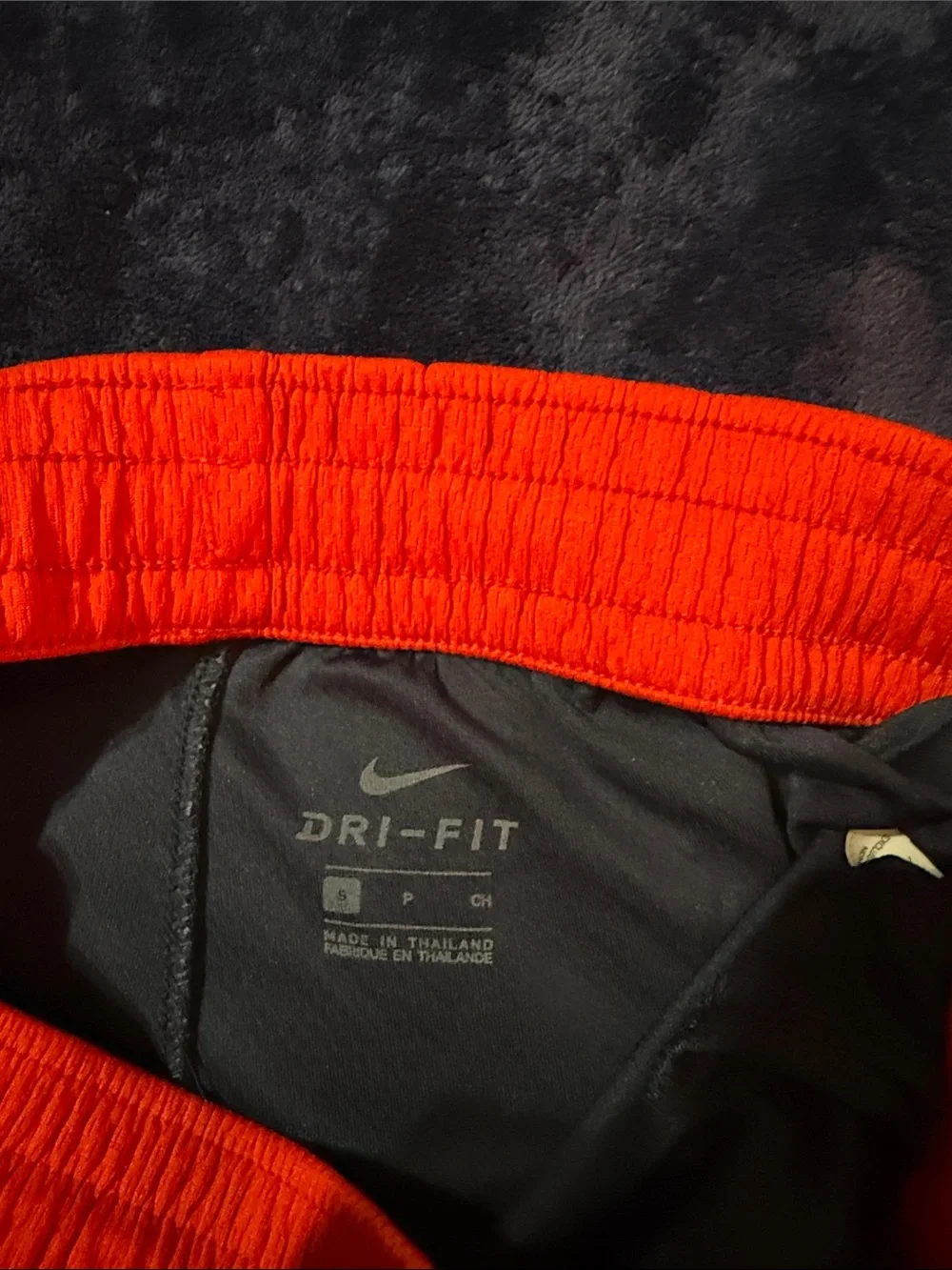 Nike Men’s Black Athletic Shorts with Red Waistband and Trim